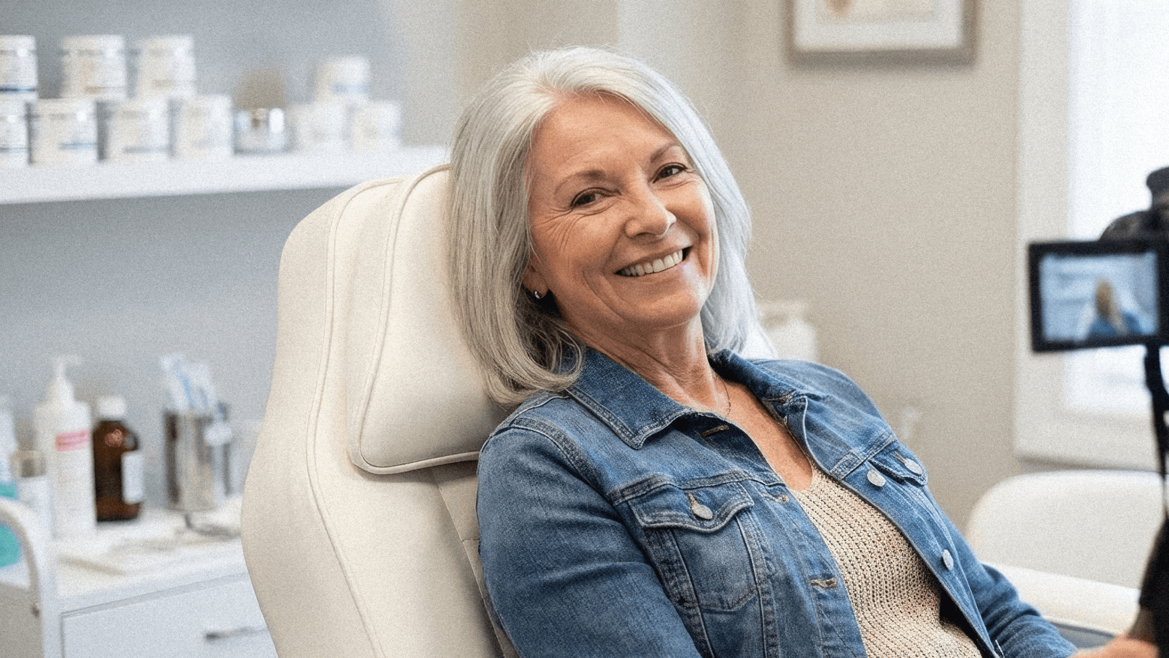 Photograph of a smiling older woman with a teal heart icon in the bottom corner, representing Meraki’s unique approach and the trusted stories we create.